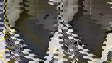 Vendbar bagagerumsmåtte