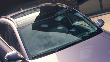 Akustisk og varmedæmpende forrude