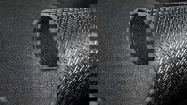 Vendbar bagagerumsmåtte